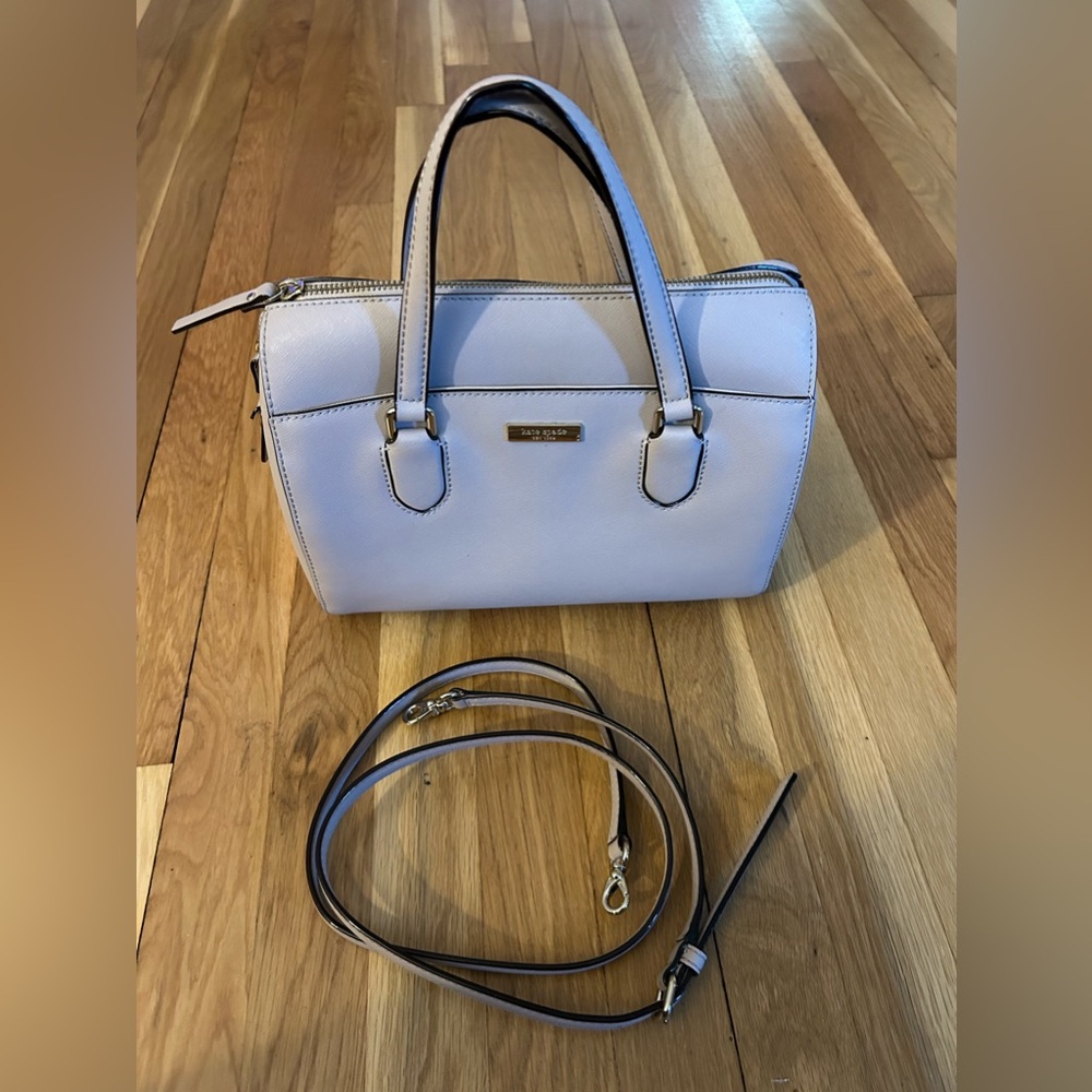 Used Tan Kate Spade bag with handles and detachable strap.